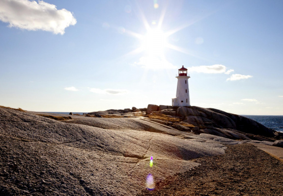 Peggy's Cove Lighthouse on a beautiful sunny and calm day.